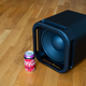 To give you an idea of the size of the Roku Subwoofer, I flipped it on its side to expose the woofer and put a Cherry Coke next to it.